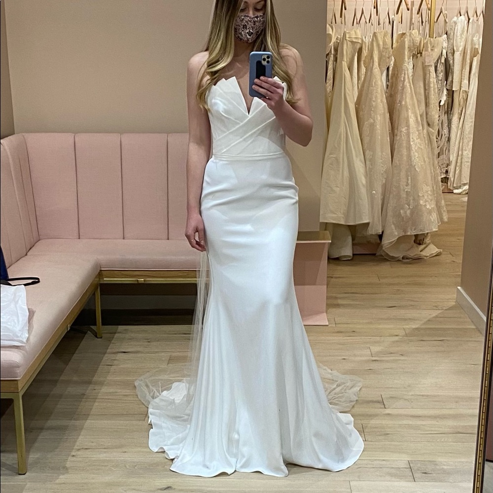 Wedding dress by Suzanne Neville
